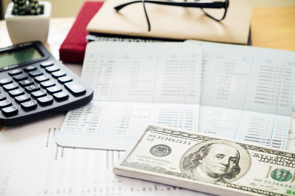 Money and Calculator with Account Book Finance